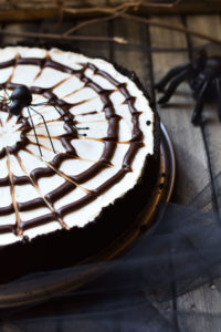 Spiderweb cake with spider aside.