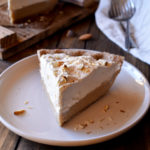 A slice of Butterscotch Pie with Spiced Rum Whipped Cream