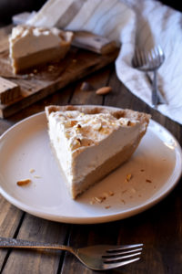 A slice of Butterscotch Pie with Spiced Rum Whipped Cream