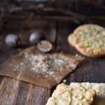 Flower Embossed Lemon Sugar Cookies with grated nutmeg and more cookies in the back