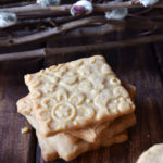 A stack of Flower Embossed Lemon Sugar Cookies