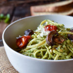 Homemade Pesto Over Noodles & Farro with bread in the background