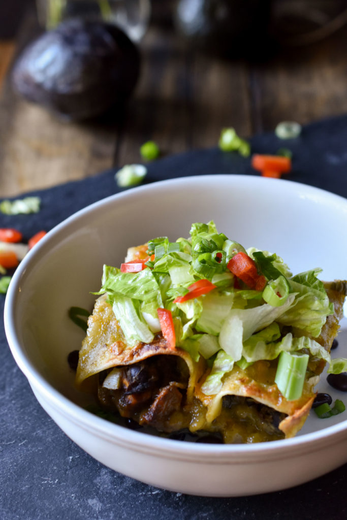 A bowl of Sweet Potato Black Bean Enchiladas