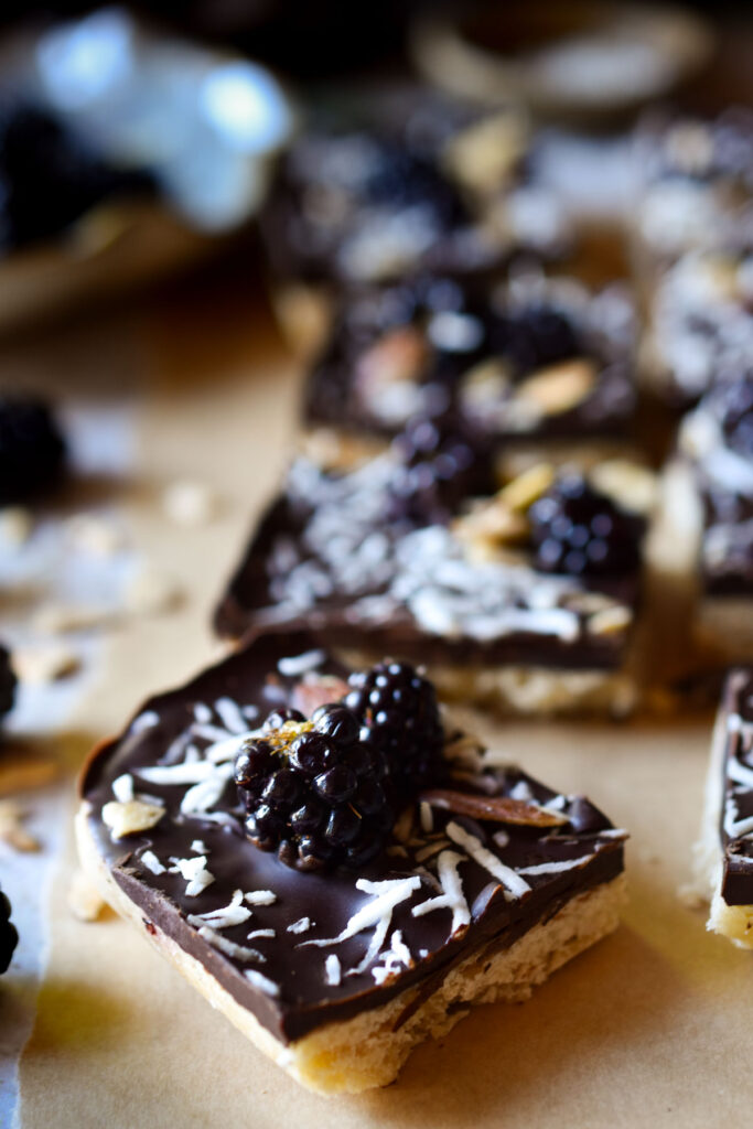 A close of of cut Chocolate Blackberry Shortbread bars